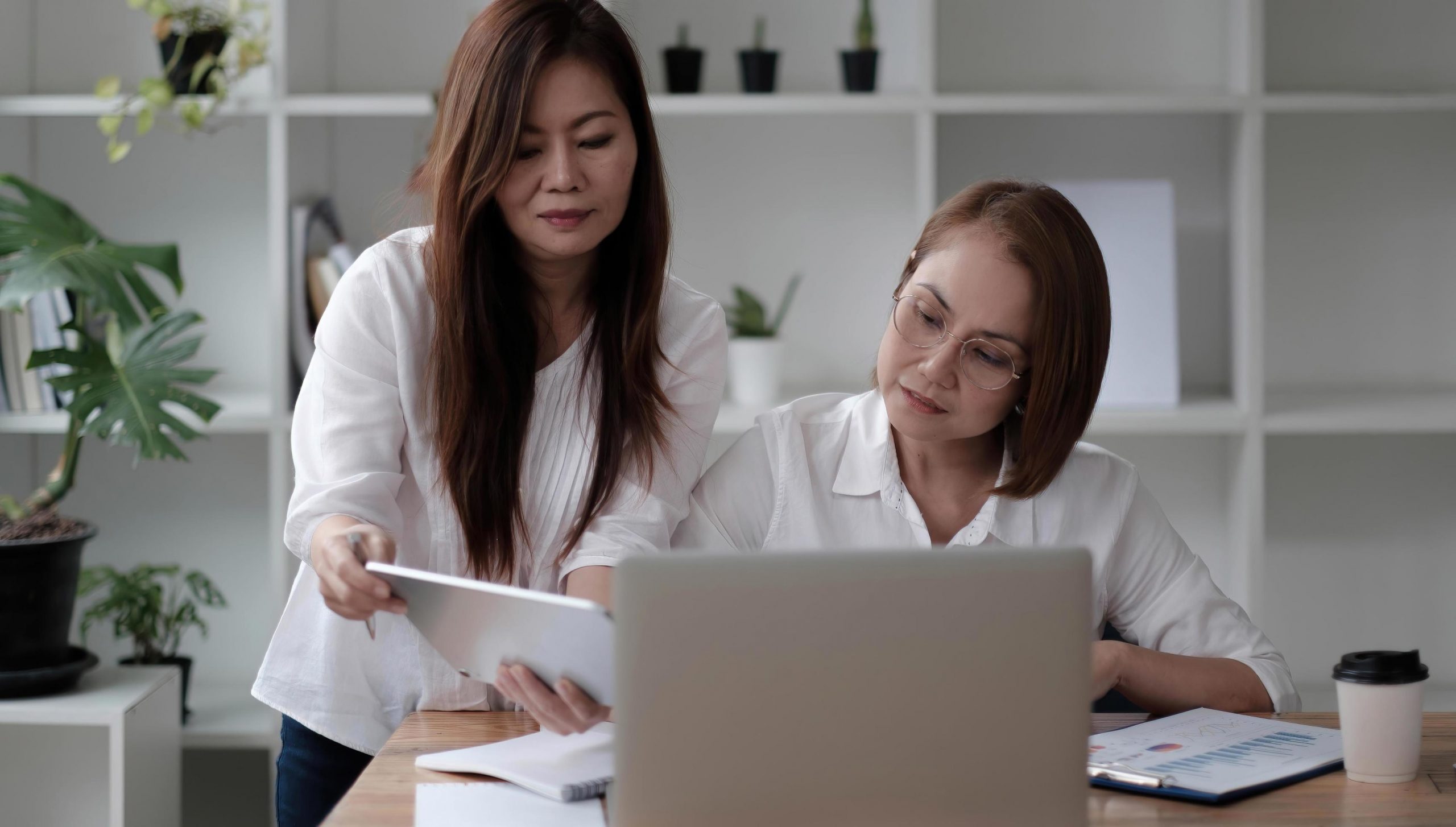 An image showing a small business owner considering VAT registration UK